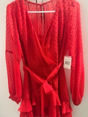 B. Smart Red Swiss Dot Long Sleeve Wrap Dress